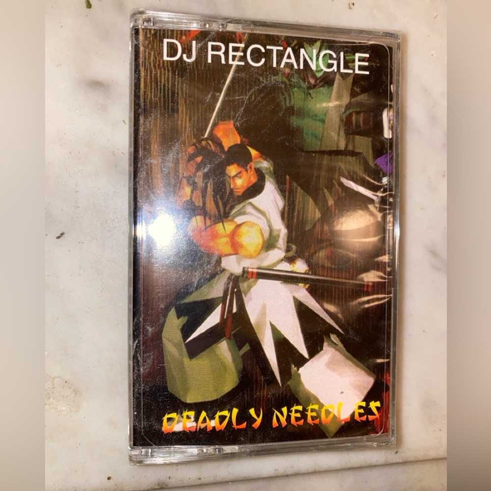 DJ RECTANGLE deadly needles cassette 
BRAND NEW SEALED 
HIP HOP MIX